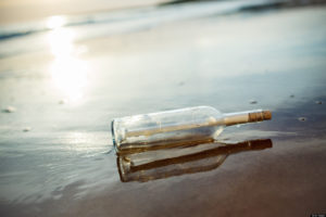 Message in bottle at seaside